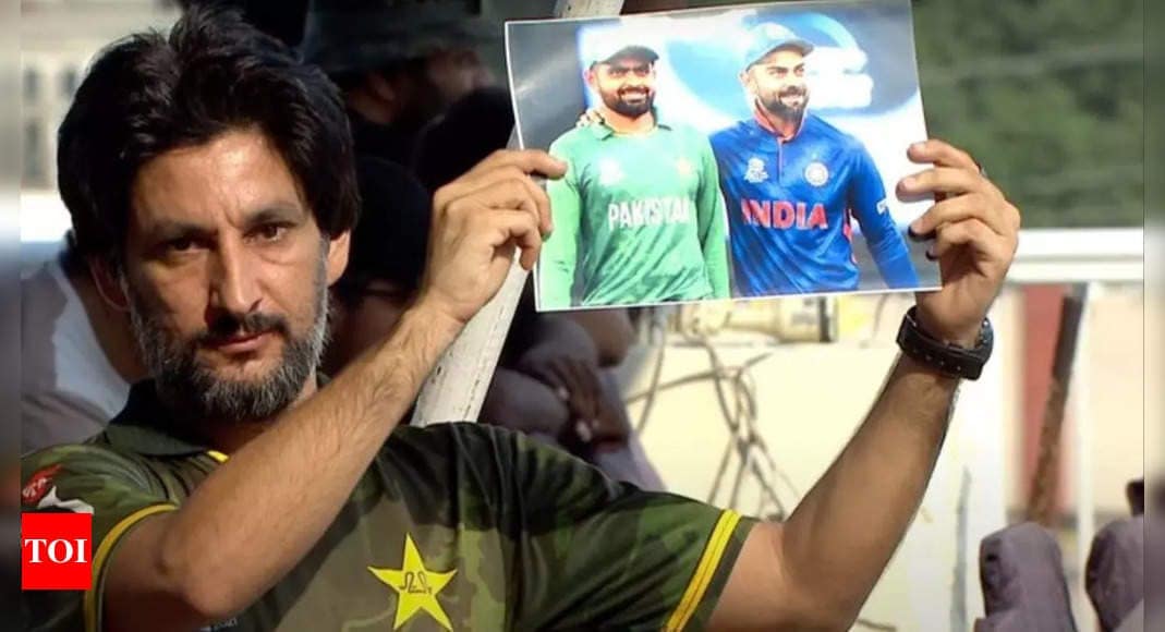 Pakistani fan holds poster of Virat Kohli, Babar Azam during Champions One-Day Cup | Cricket News Pakistani fan holds poster of Virat Kohli, Babar Azam during Champions One-Day Cup | Cricket News